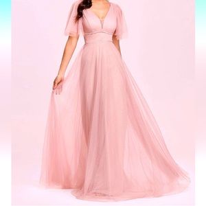 Long tulle bridesmaid dress with ruffle sleeve, the dress is elegant and modern